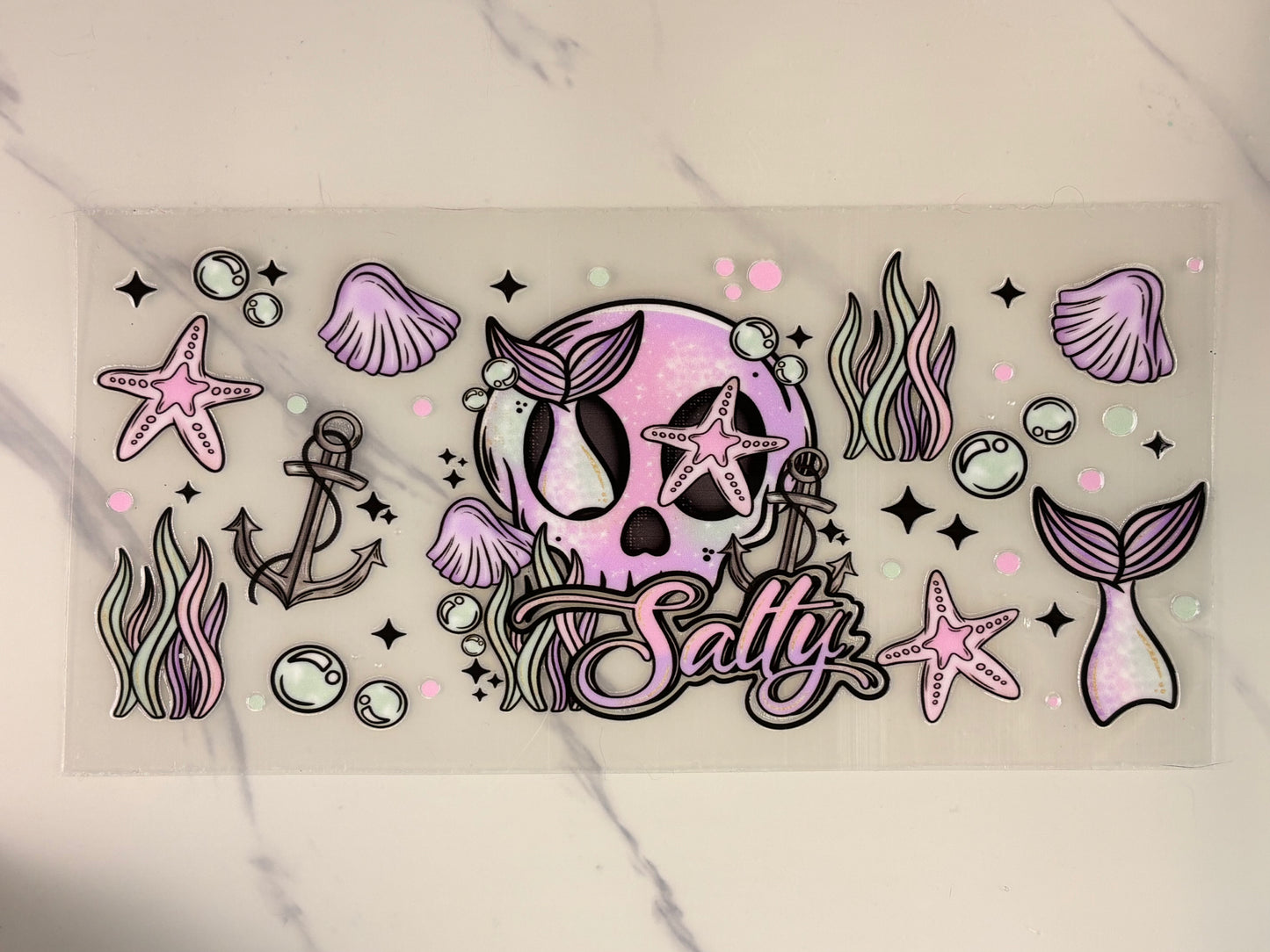 Salty (mermaid, fins, and skulls)