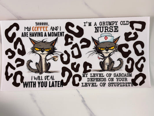 Grumpy coffee loving nurse cat