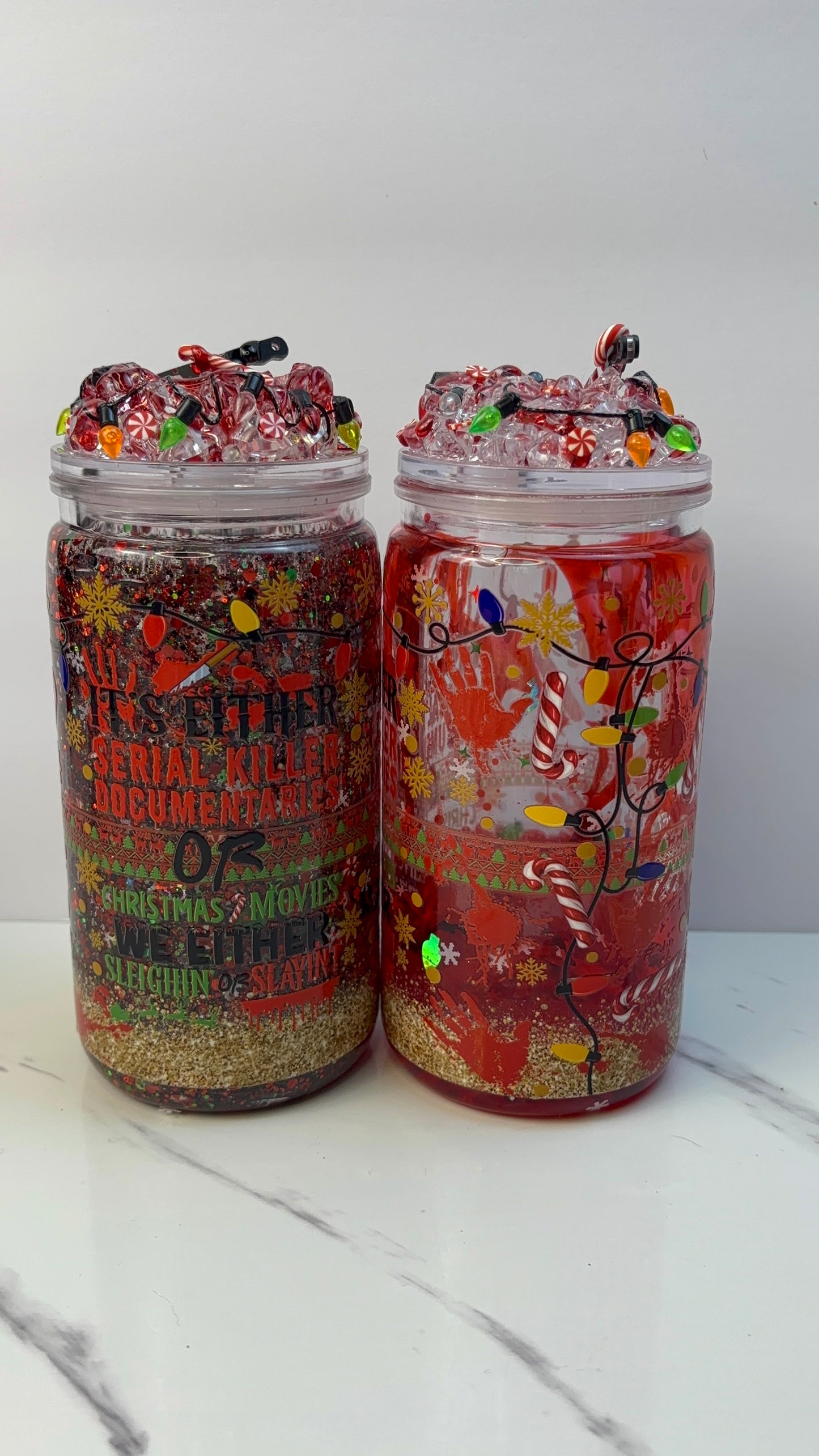 2 styles-Slaying or sleighing snow globe cup.