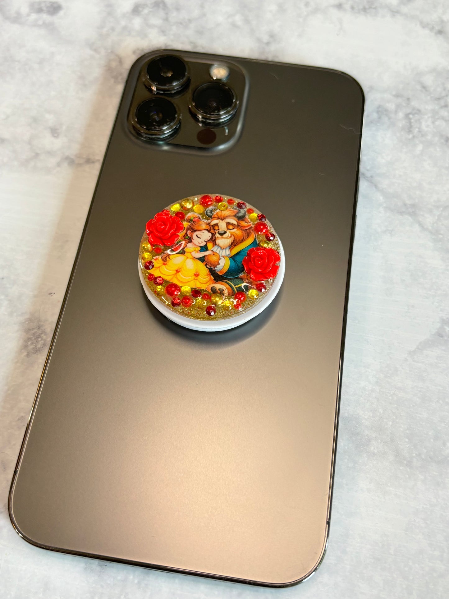 Beauty and the beast inspired phone grip