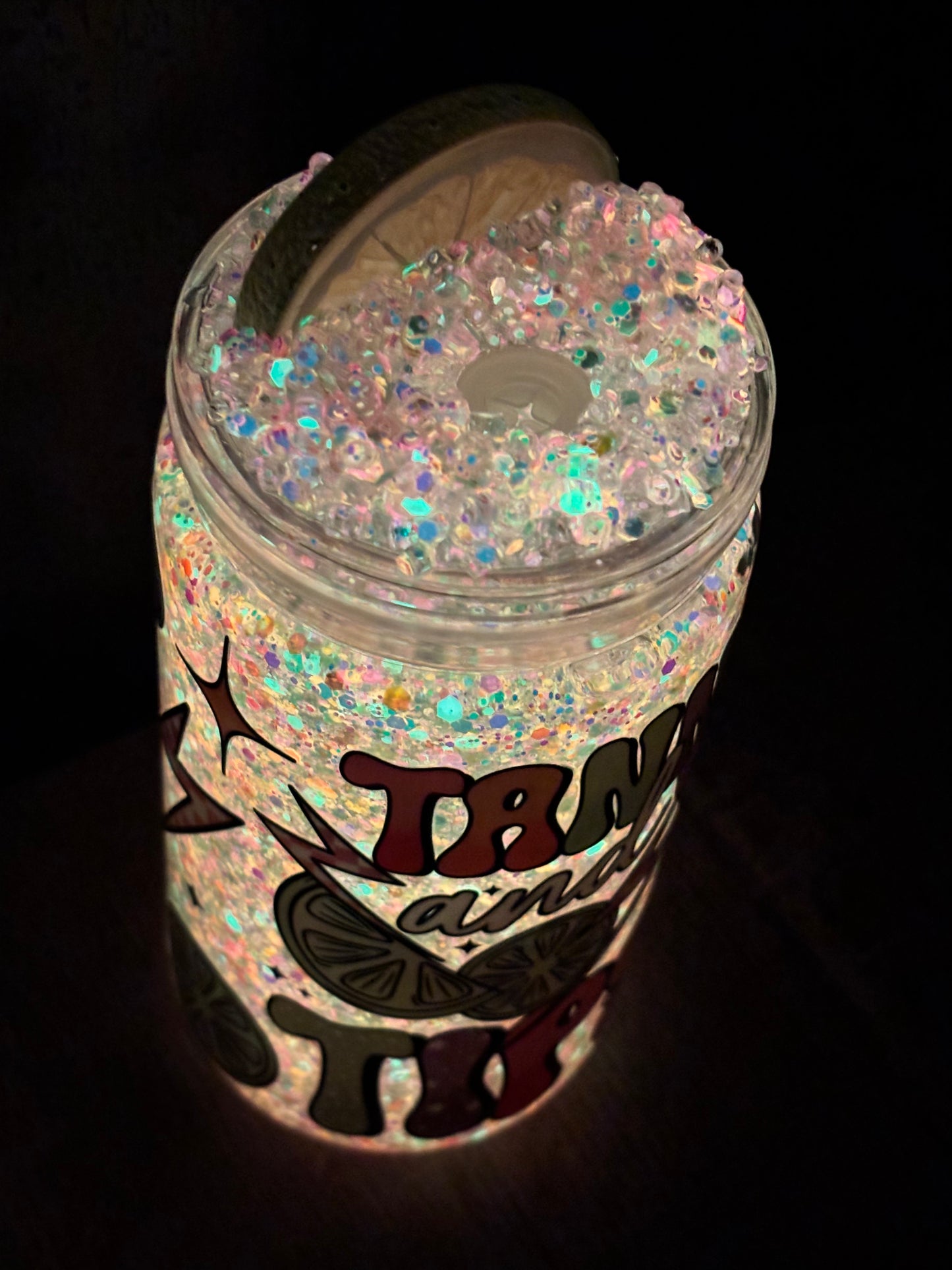 Tan and tipsy glowing snow globe