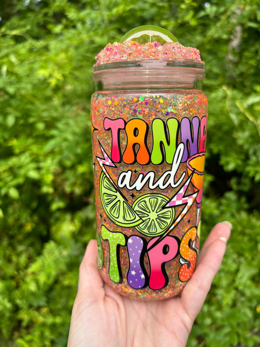 Tan and tipsy glowing snow globe