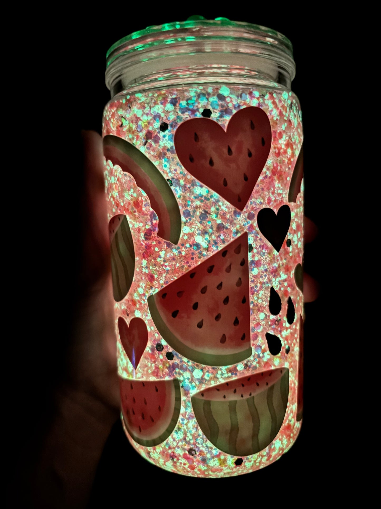 Glowing watermelon snow globe