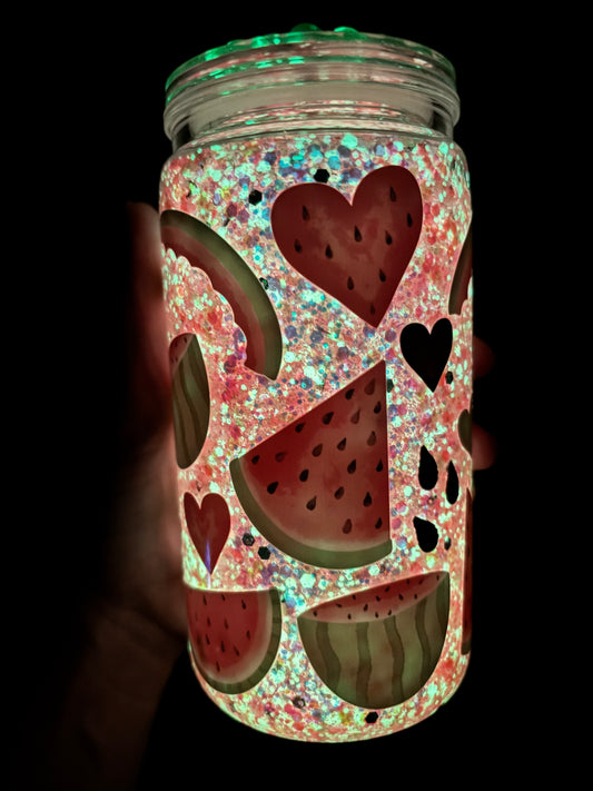 Glowing watermelon snow globe