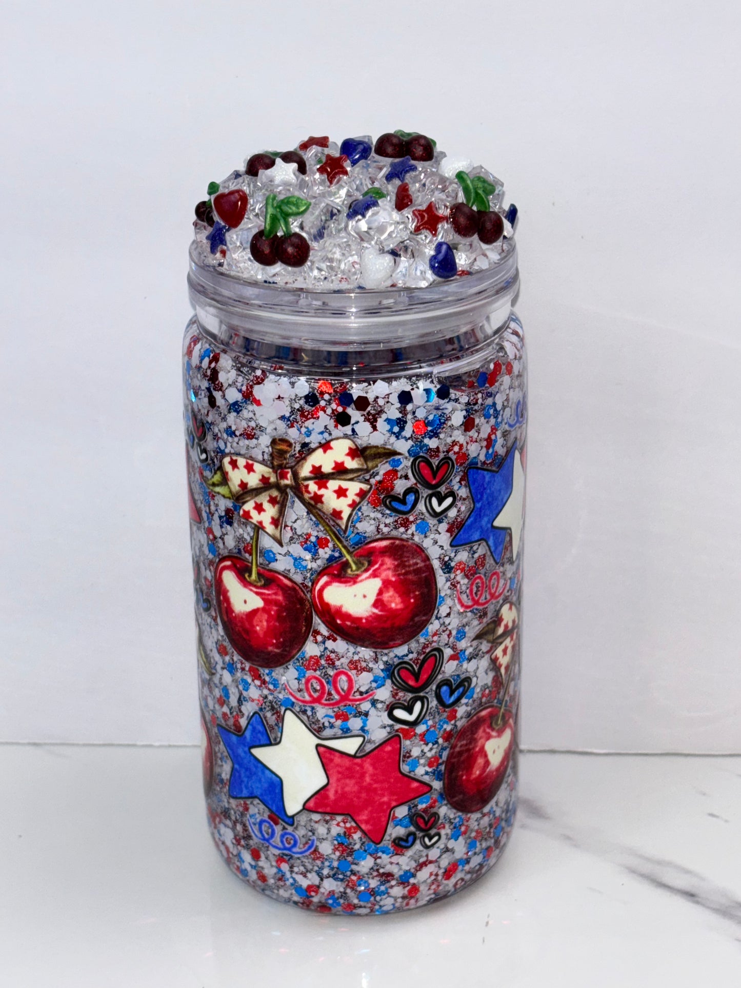 Star spangled cherry snow globe cup