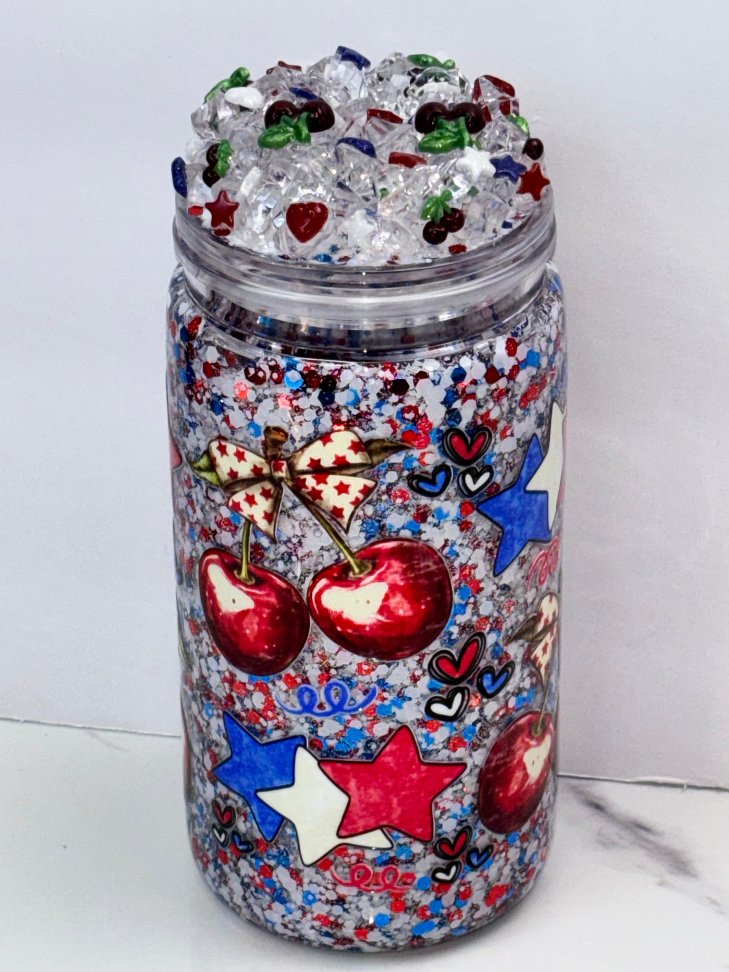 Star spangled cherry snow globe cup