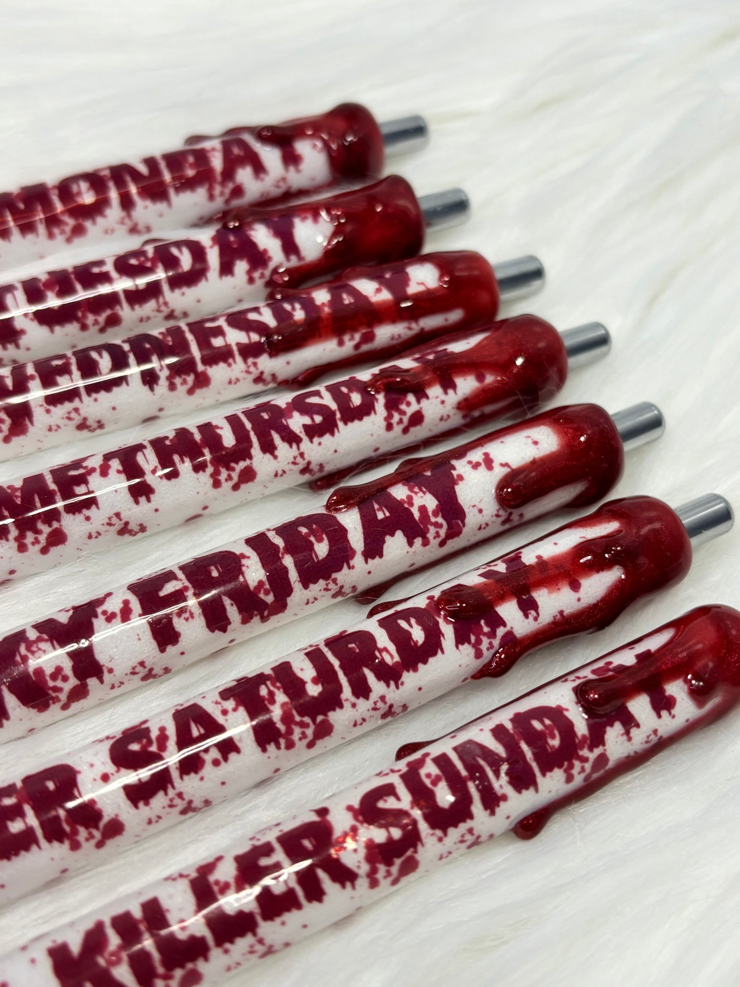 Horror days of week glitter gel pens. 7 pens.