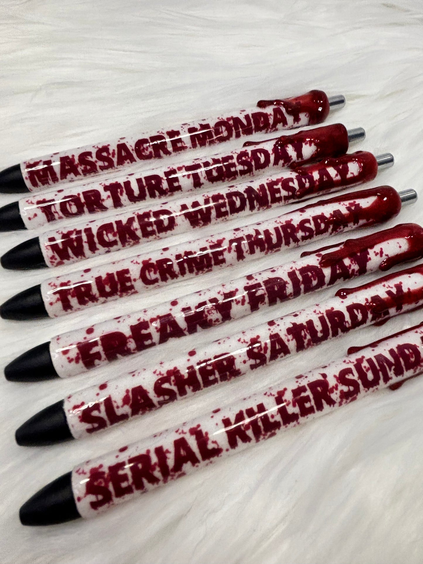 Horror days of week glitter gel pens. 7 pens.