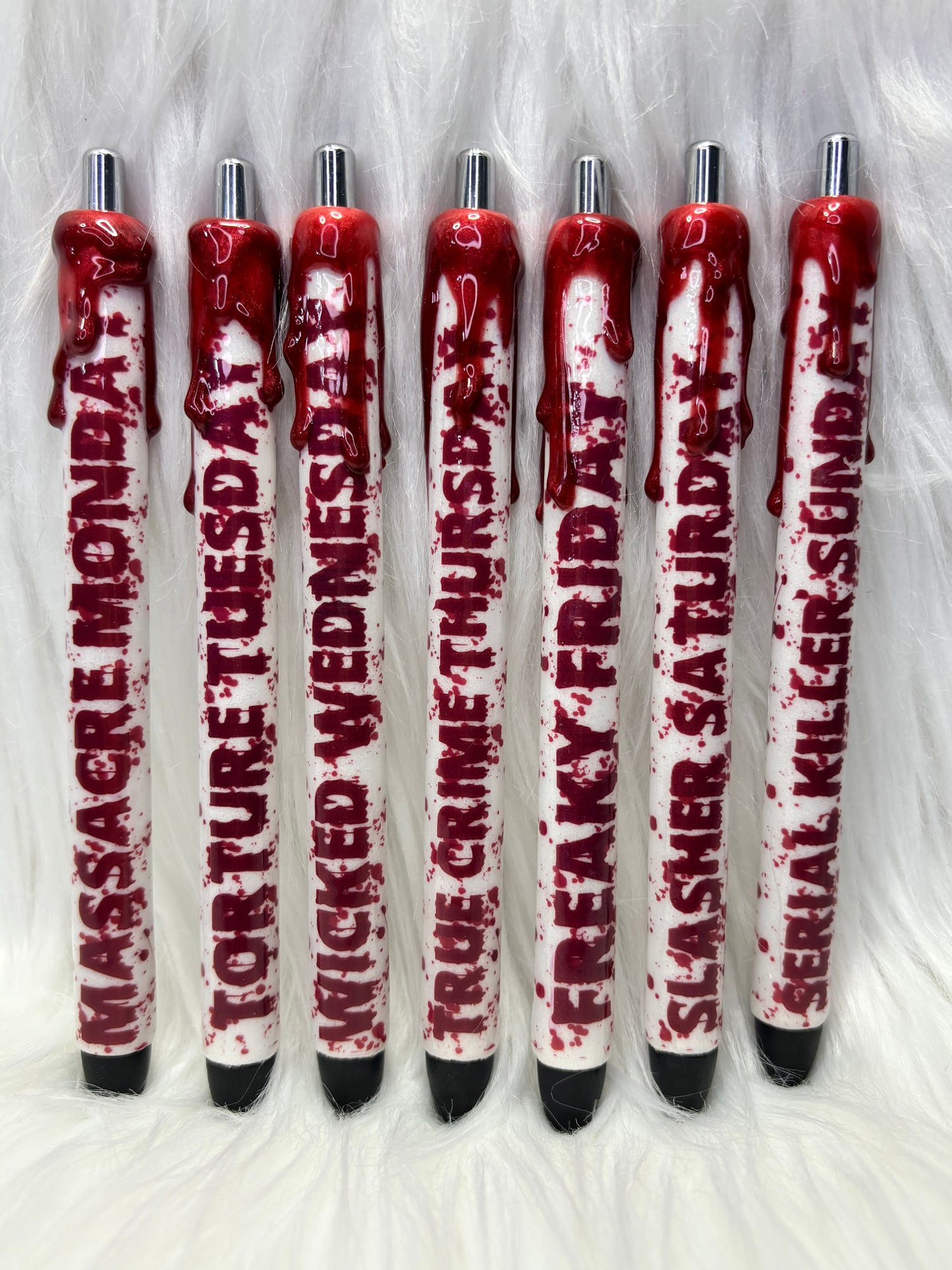 Horror days of week glitter gel pens. 7 pens.