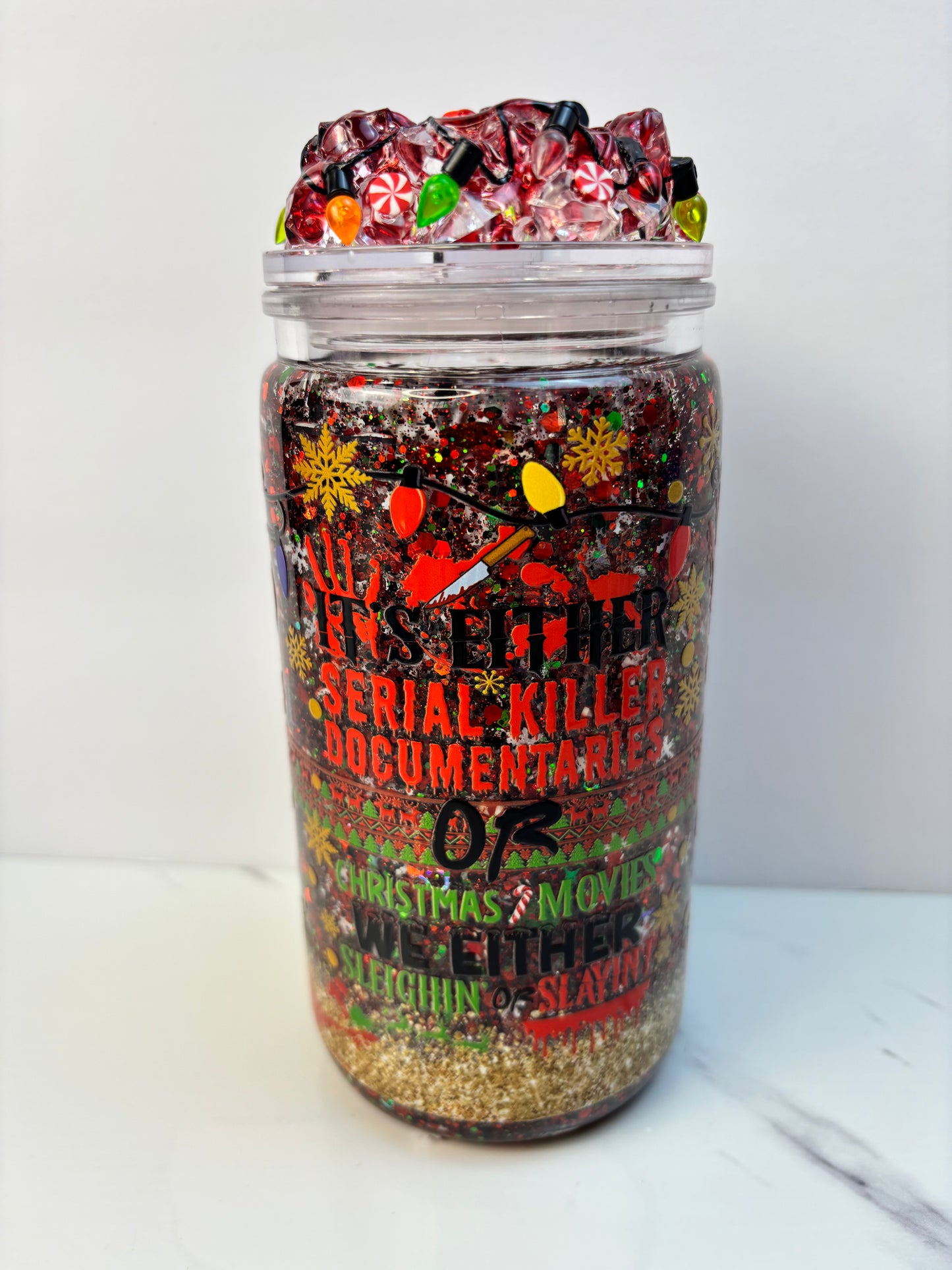 2 styles-Slaying or sleighing snow globe cup.