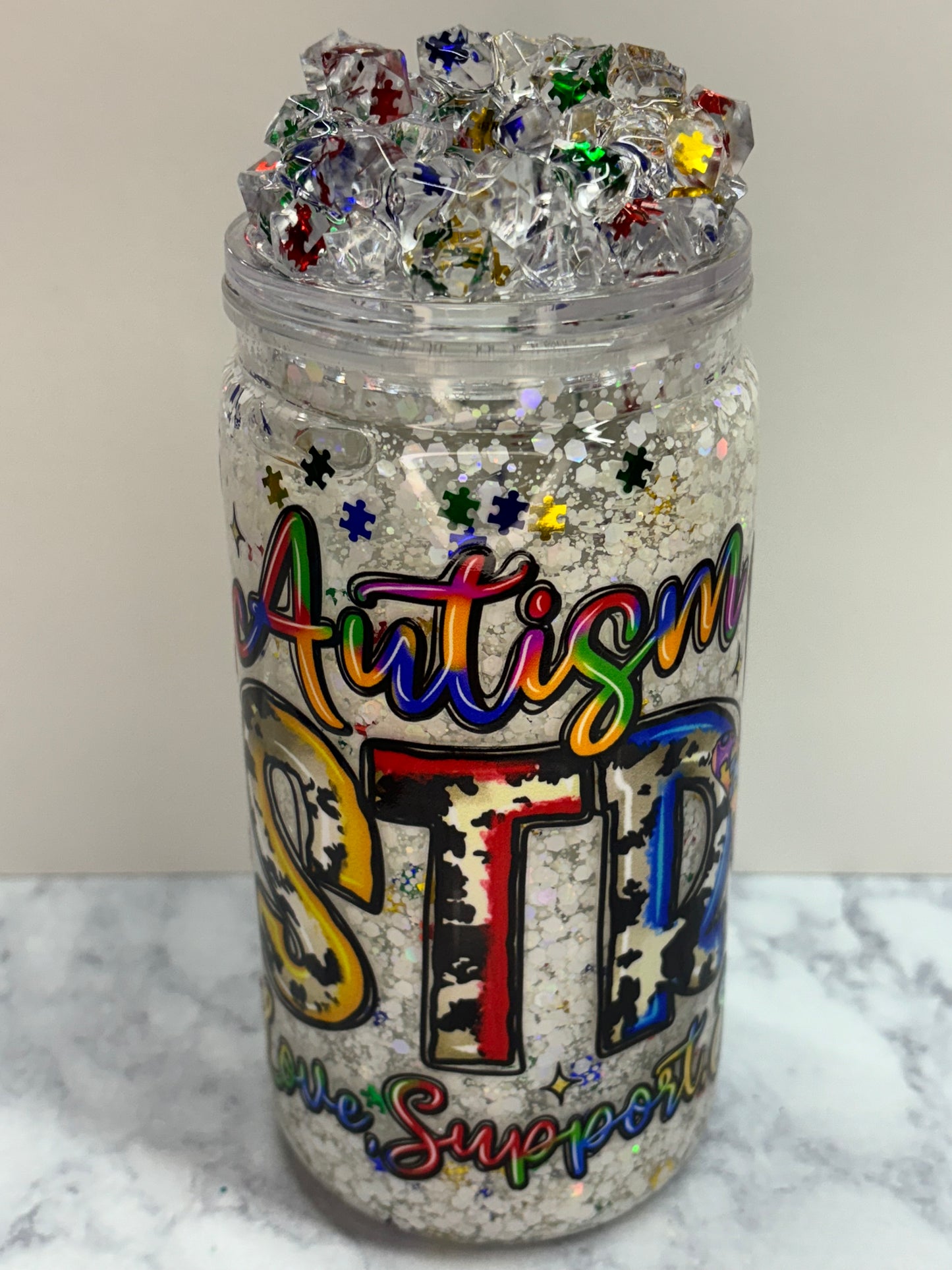 Autism strong snow globe
