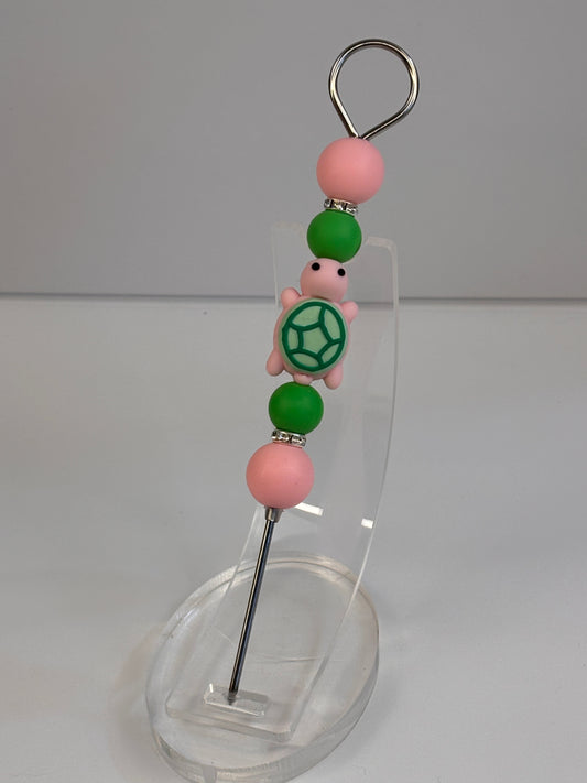 Pink turtle pokey tool