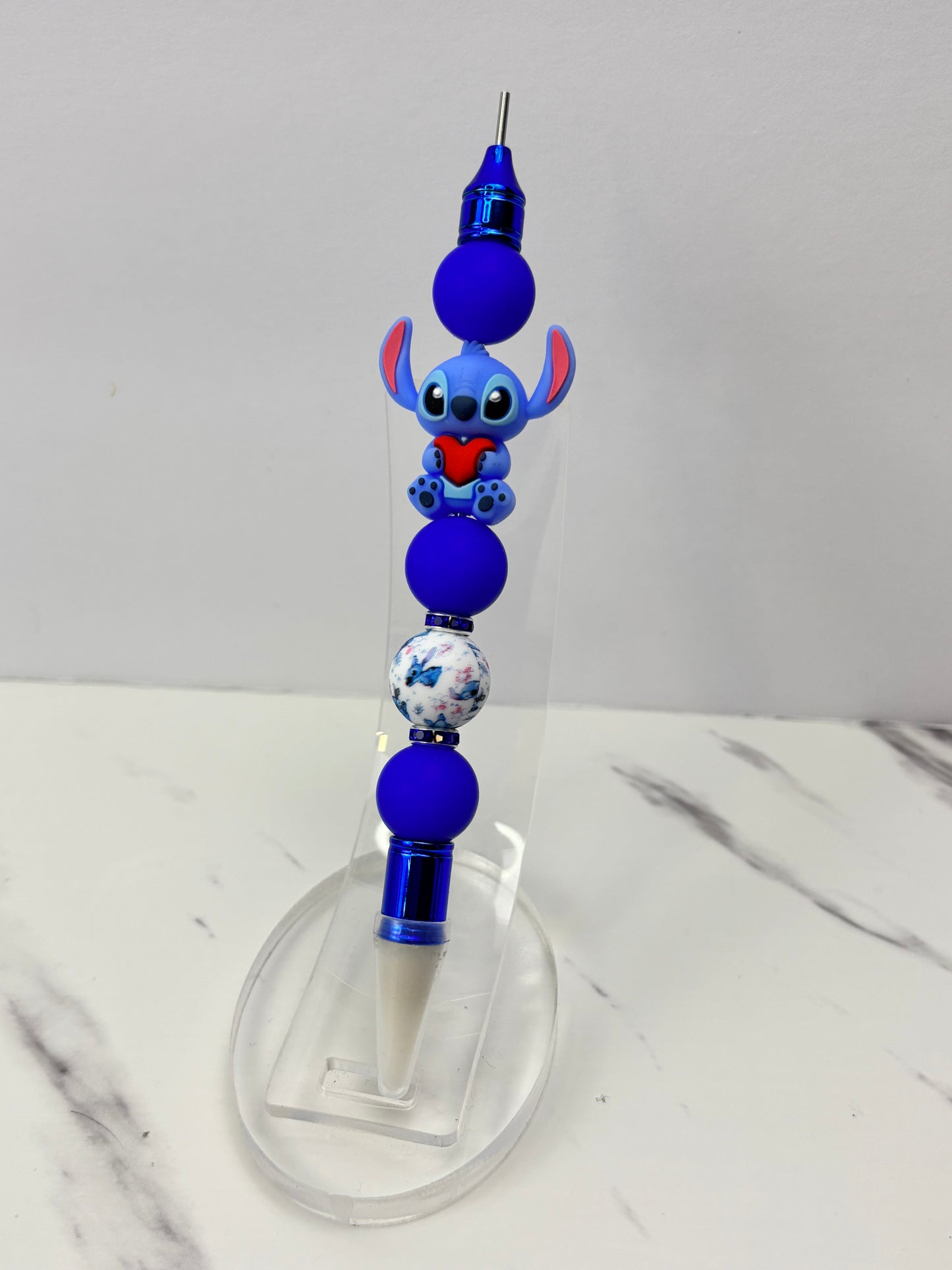 Beaded wax tool for flat back pearls.