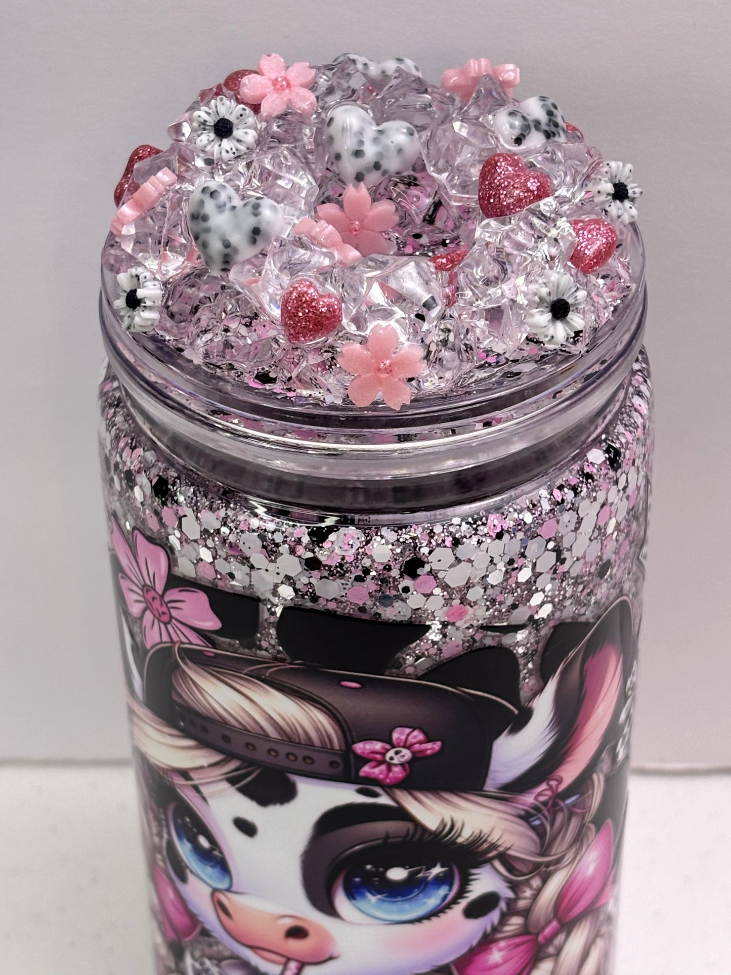 Pink cow snow globe