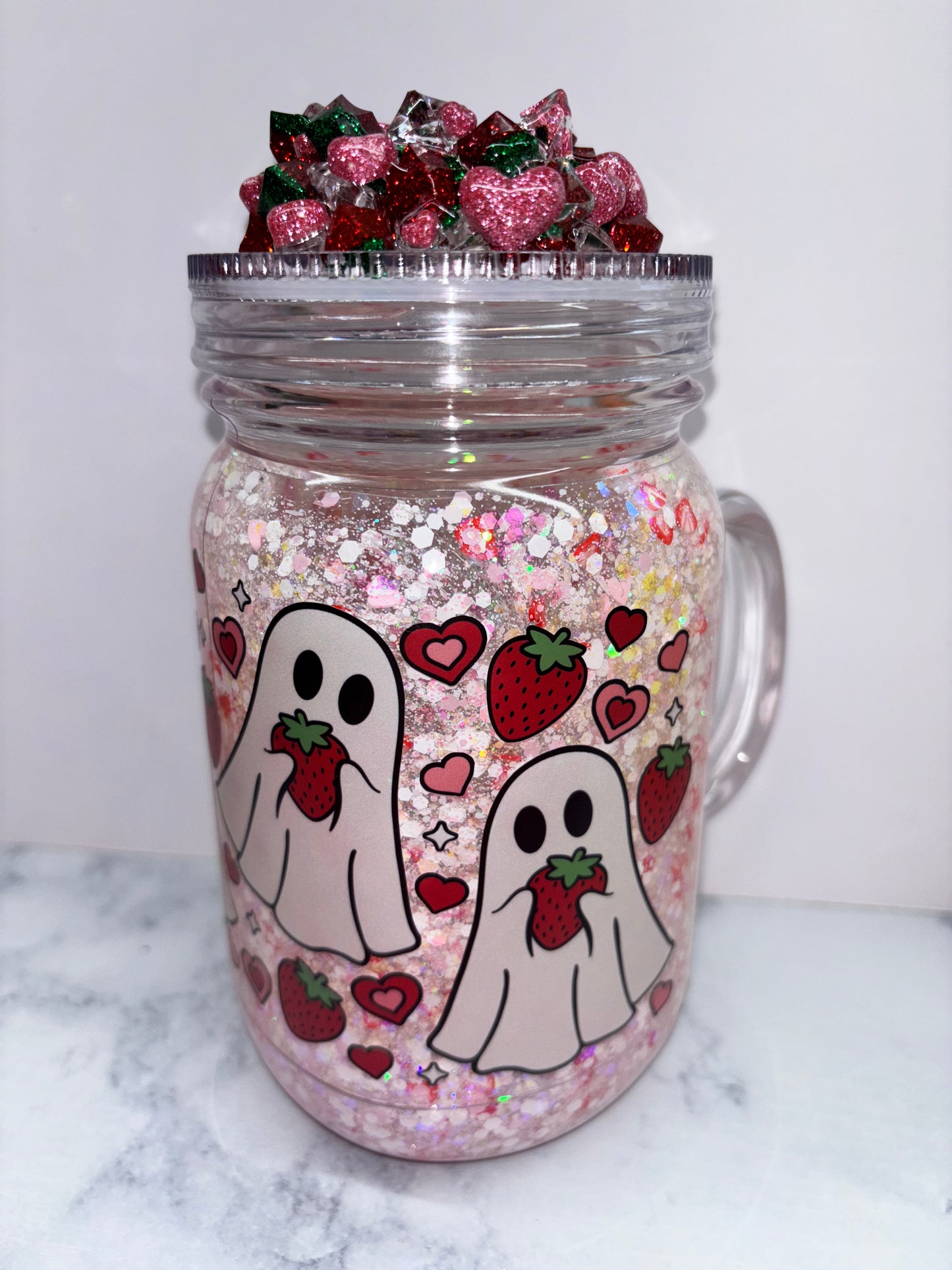 Strawberry ghost snow globe