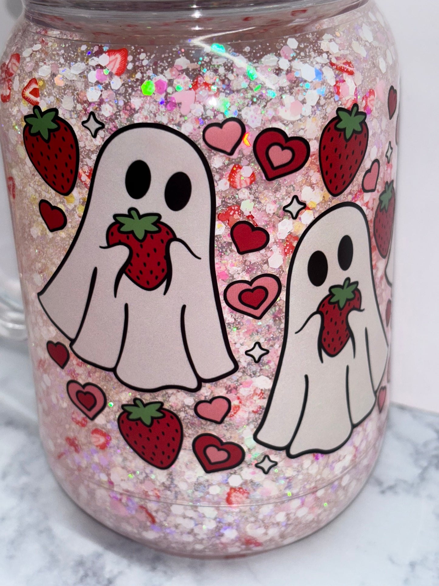 Strawberry ghost snow globe