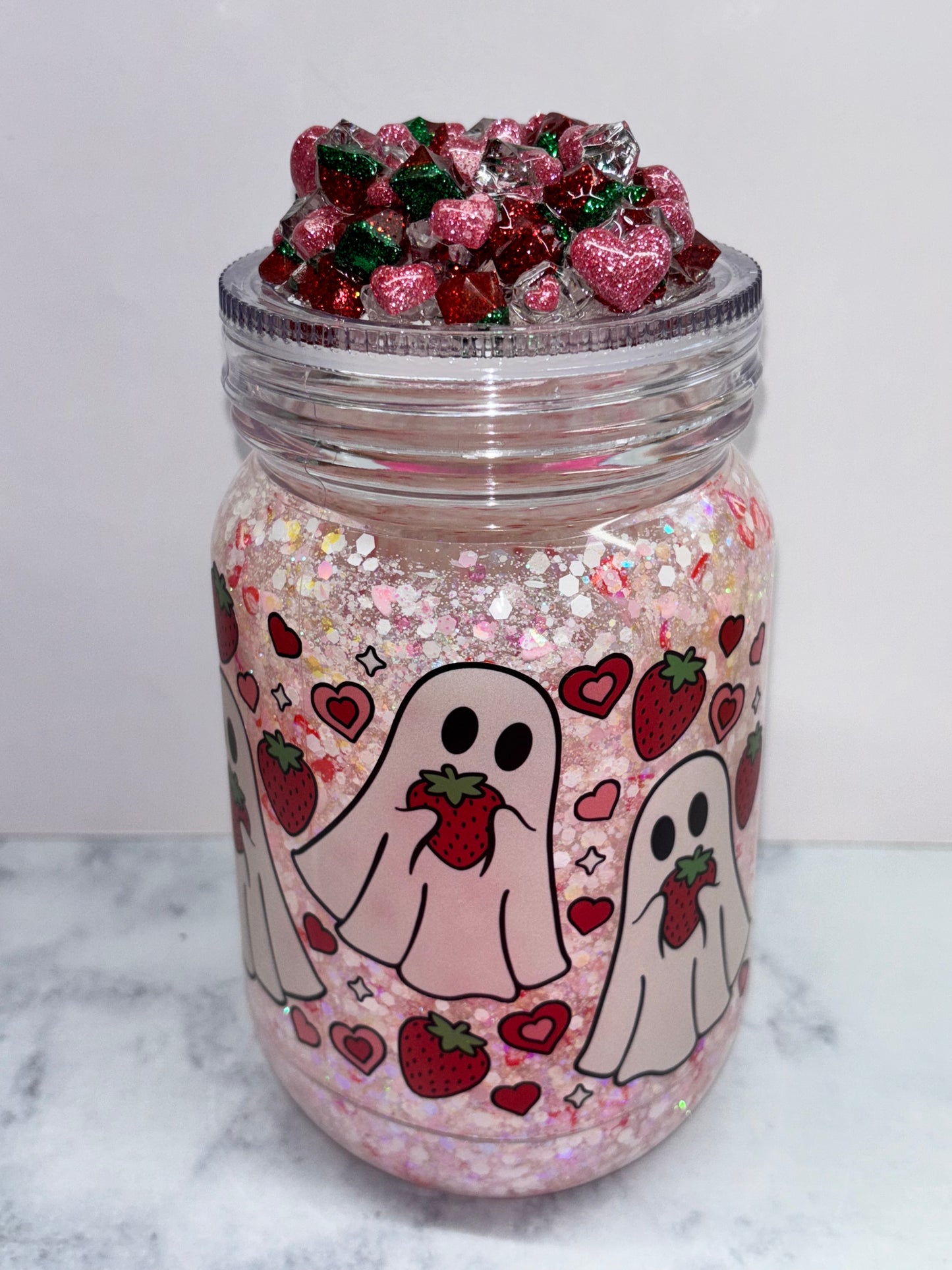 Strawberry ghost snow globe