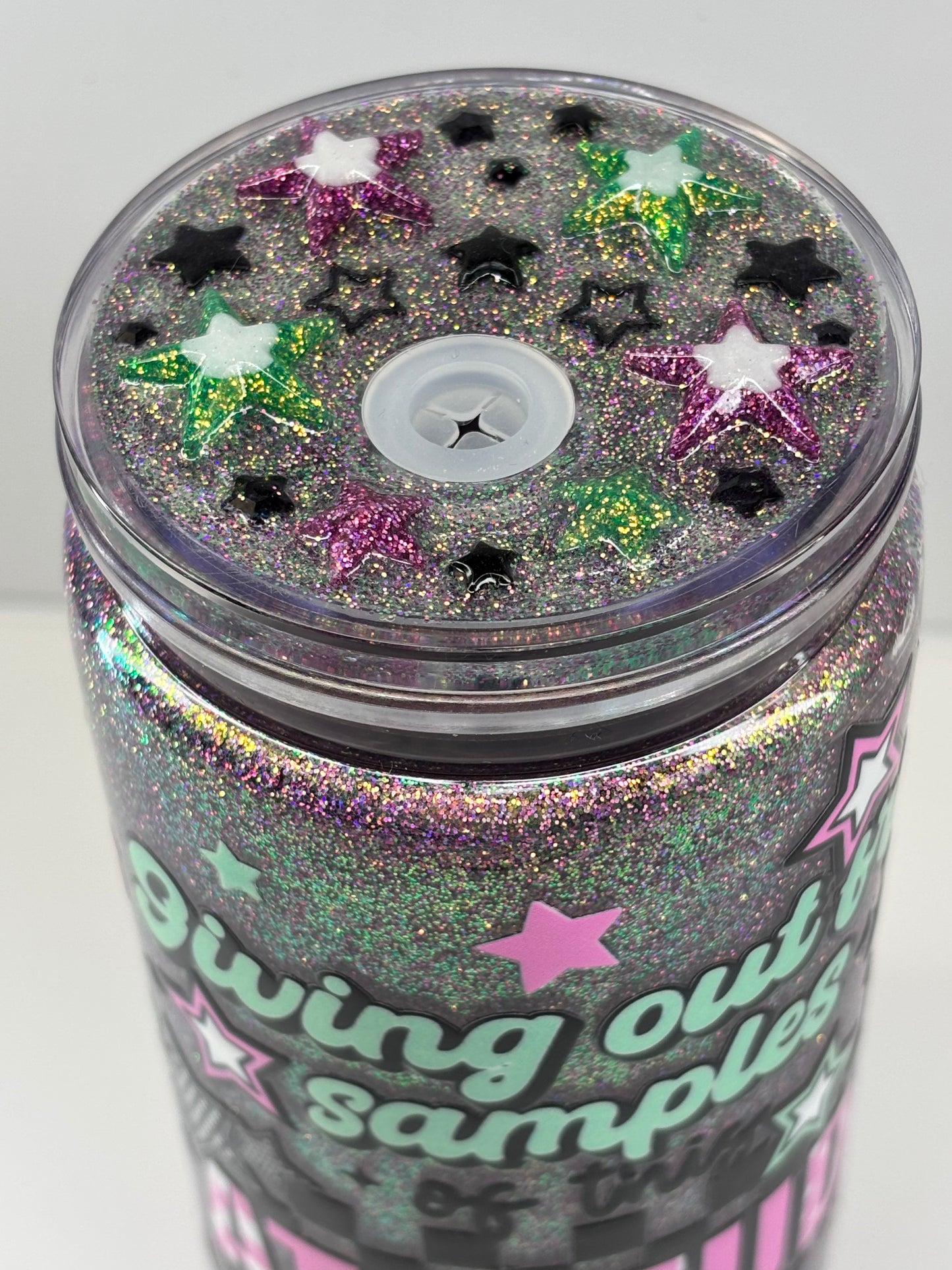Giving out free samples of attitude snow globe cup
