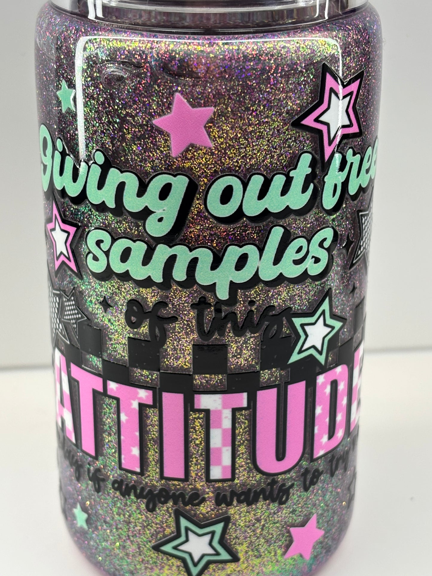 Giving out free samples of attitude snow globe cup