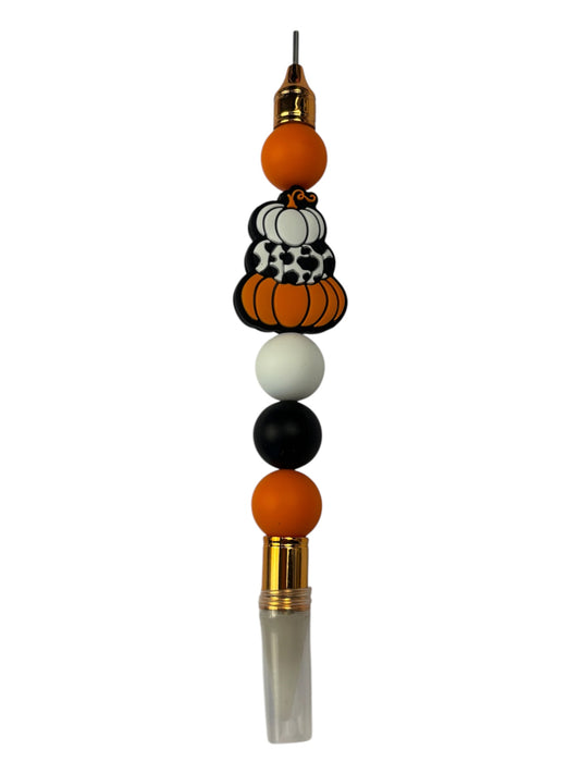 Stacked pumpkins, wax tip tool