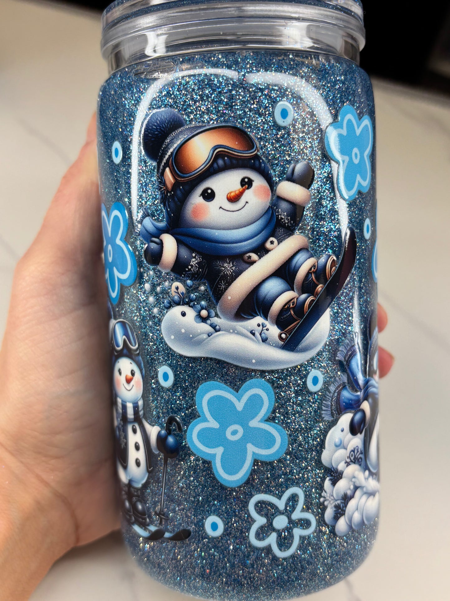 Skiing snowman snow globe cup