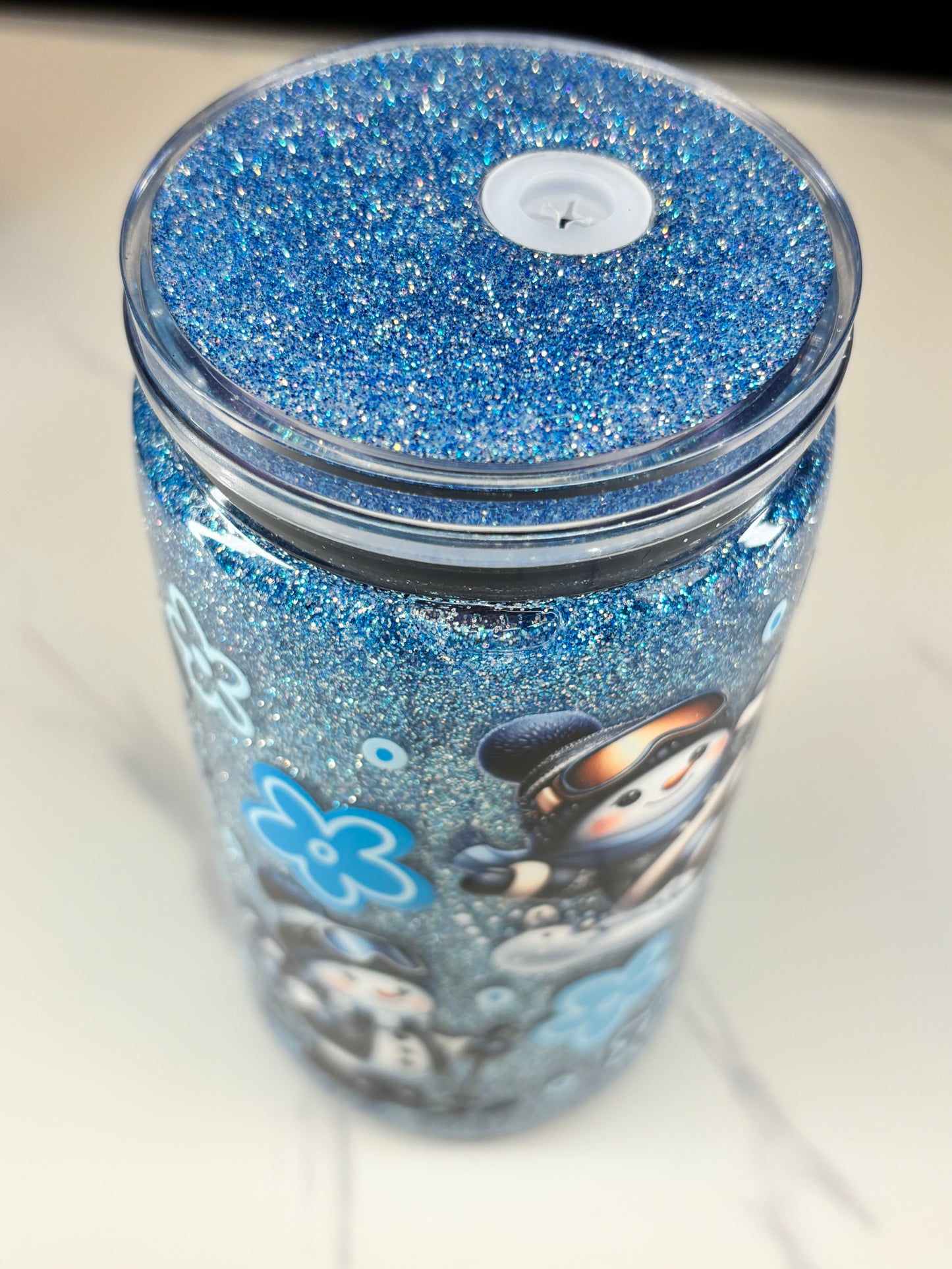 Skiing snowman snow globe cup