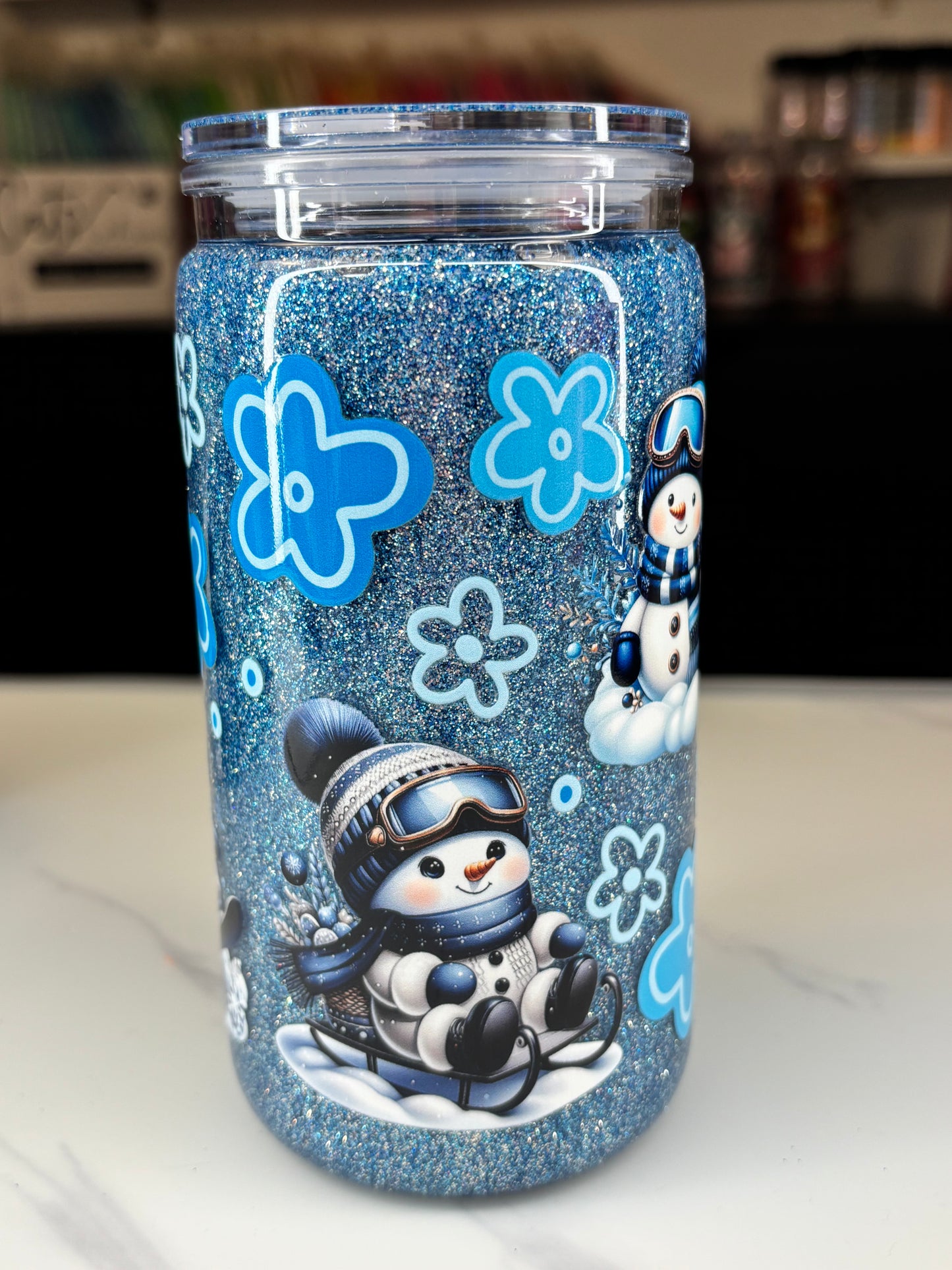Skiing snowman snow globe cup