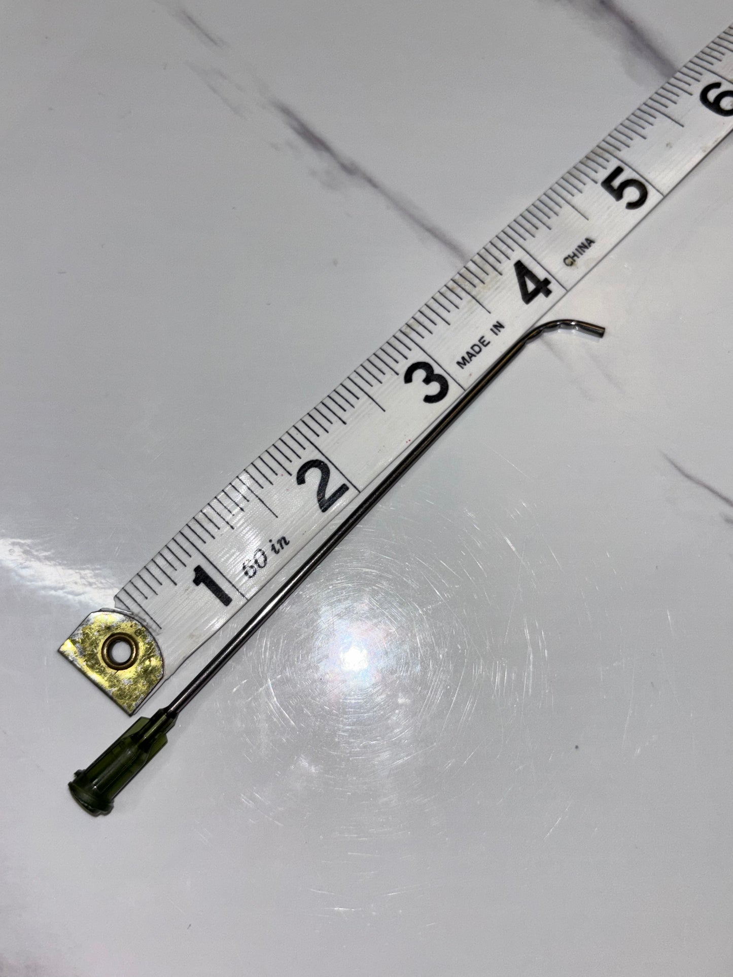 Blunt tip curved needle
